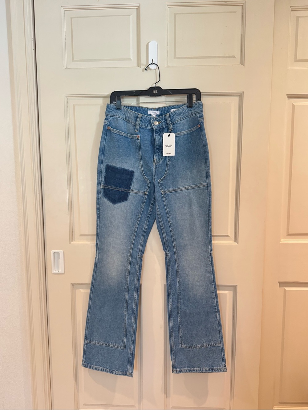 Brand new with tag Forever 21 Blue Patch Pocket mid rise flare jeans